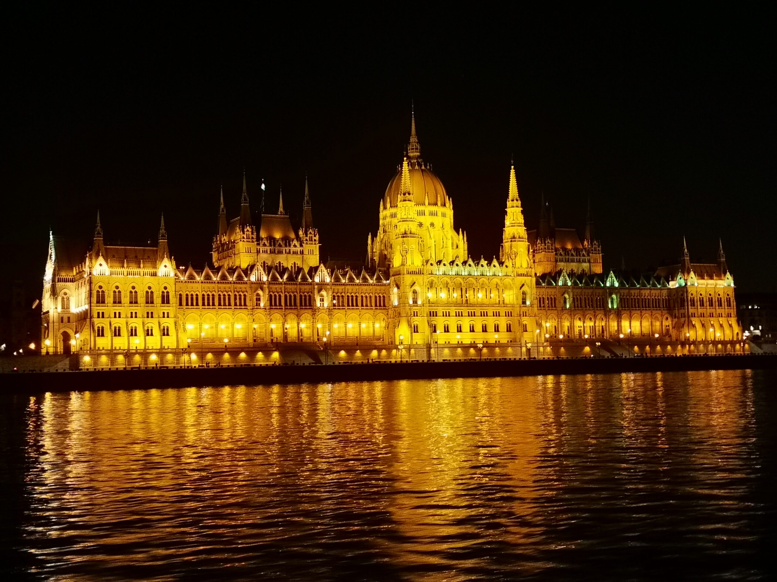 The gorgeous Hungarian Parliament Building light up with the reflection in the rippling river.